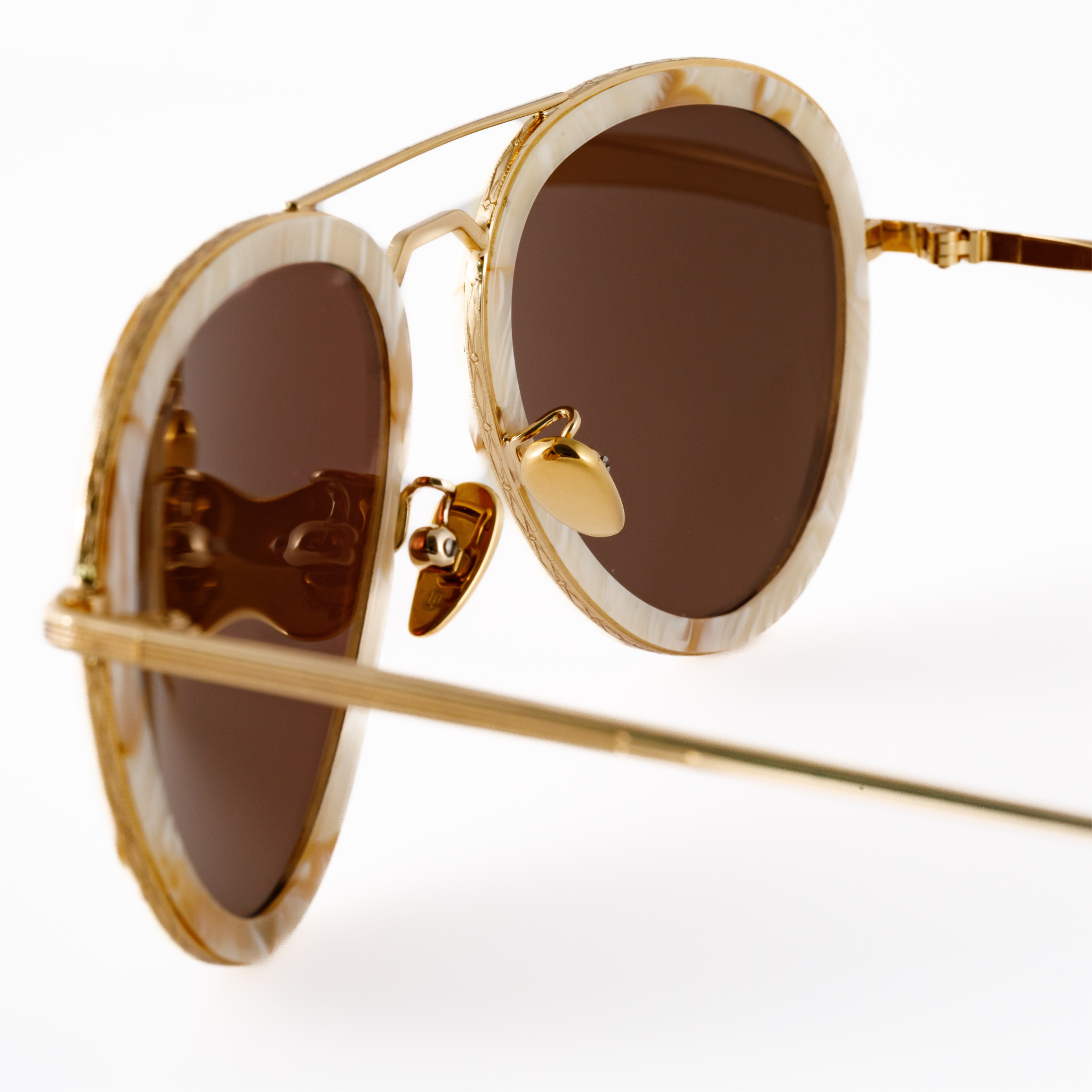 Mens Aviator sunglasses for small faces gold  internal view showcases gold adjustable ceramic nose pads and durable gold hinges