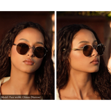 Model with small face wearing Memorí round gold sunglasses at two different angles. Showcases the angular nose bridge and scalloped temple arm detail. Expertly designed to be the best fitting sunglasses for small faces.
