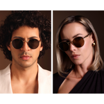 sunglasses with retro scalloped edge detail on temple arm, designed for men and women, photographed side by side on male and female model, each who have a smaller than average face and perfectly fit the sunglasses