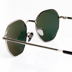 Intricate silver designer sunglasses handmade in italy to be the best sunglasses for narrow faces. Macro view of adjustable silver ceramic nose pads.