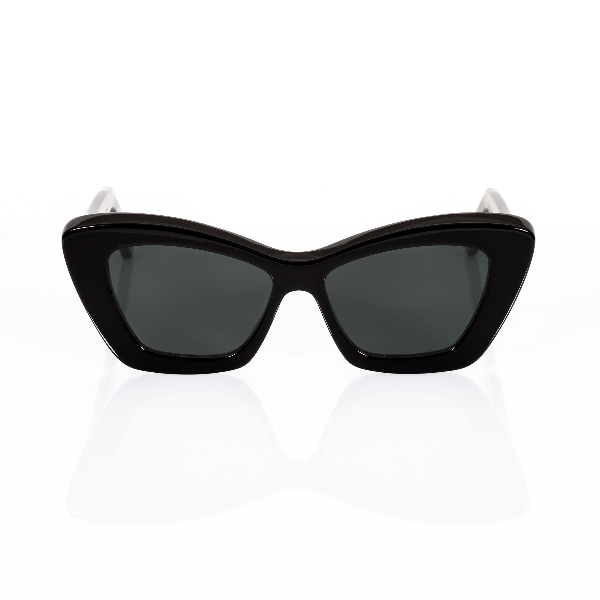 Black cat eye sunglasses for women - view shown from the front. Features a sleek, curved top with square bottoms, kind of like a cat eye sunglass and a wayfarer hybrid. Materials are black Italian acetate with dark gray lenses, which appear black to the eye in most light conditions.
