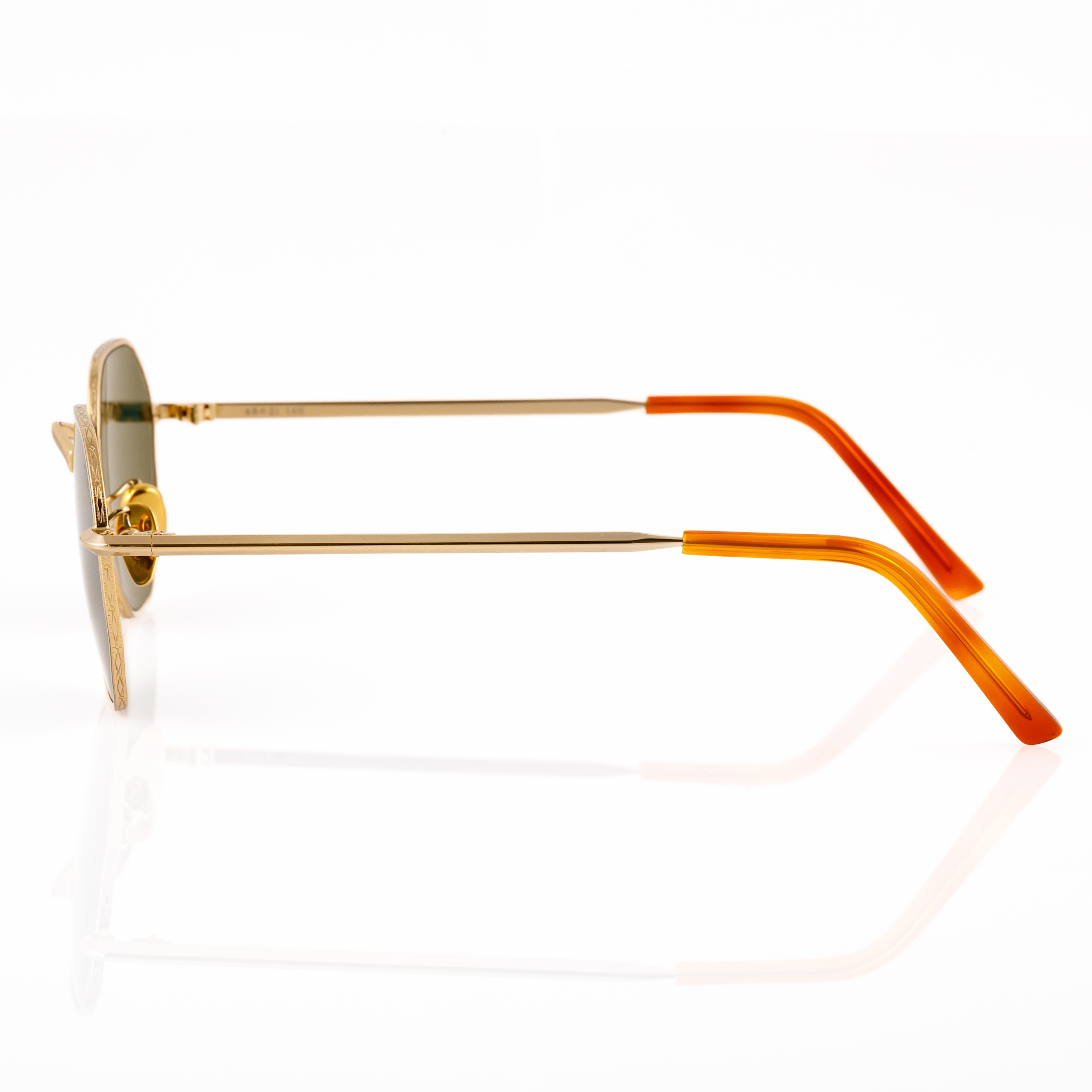 Best gold metal hexagon sunglasses for narrow faces for men and women. Features V nose bridge and green lenses. Profile view shows sturdy temple arms and tortoise pattern temple tips.