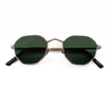 Memorí small fit designer sunglasses. folded view shows etched detail in nose bridge and green lenses. 