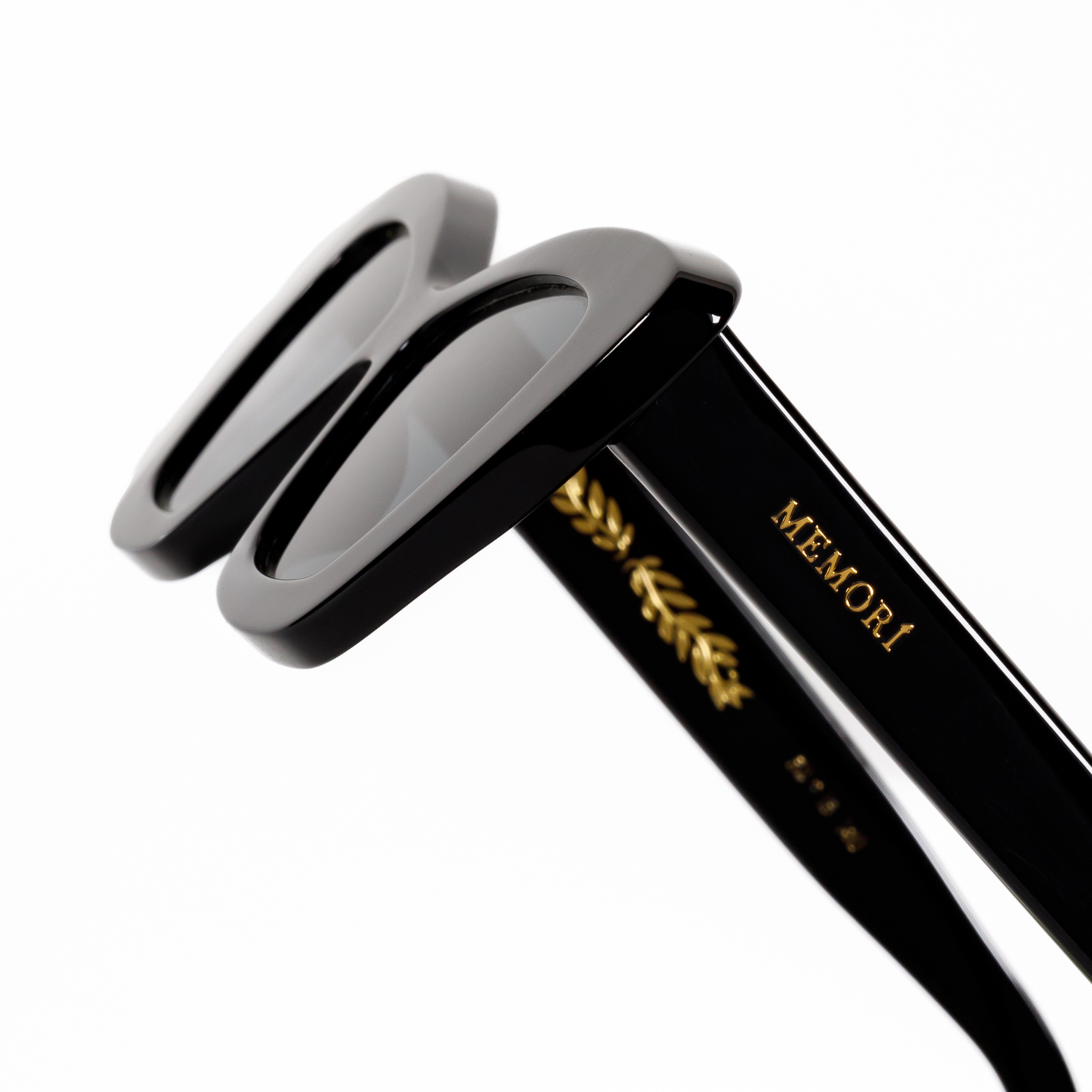 black acetate cate eye sunglasses size small, macro product image features angled top detail. Best cat eye sunglasses for small and narrow faces.