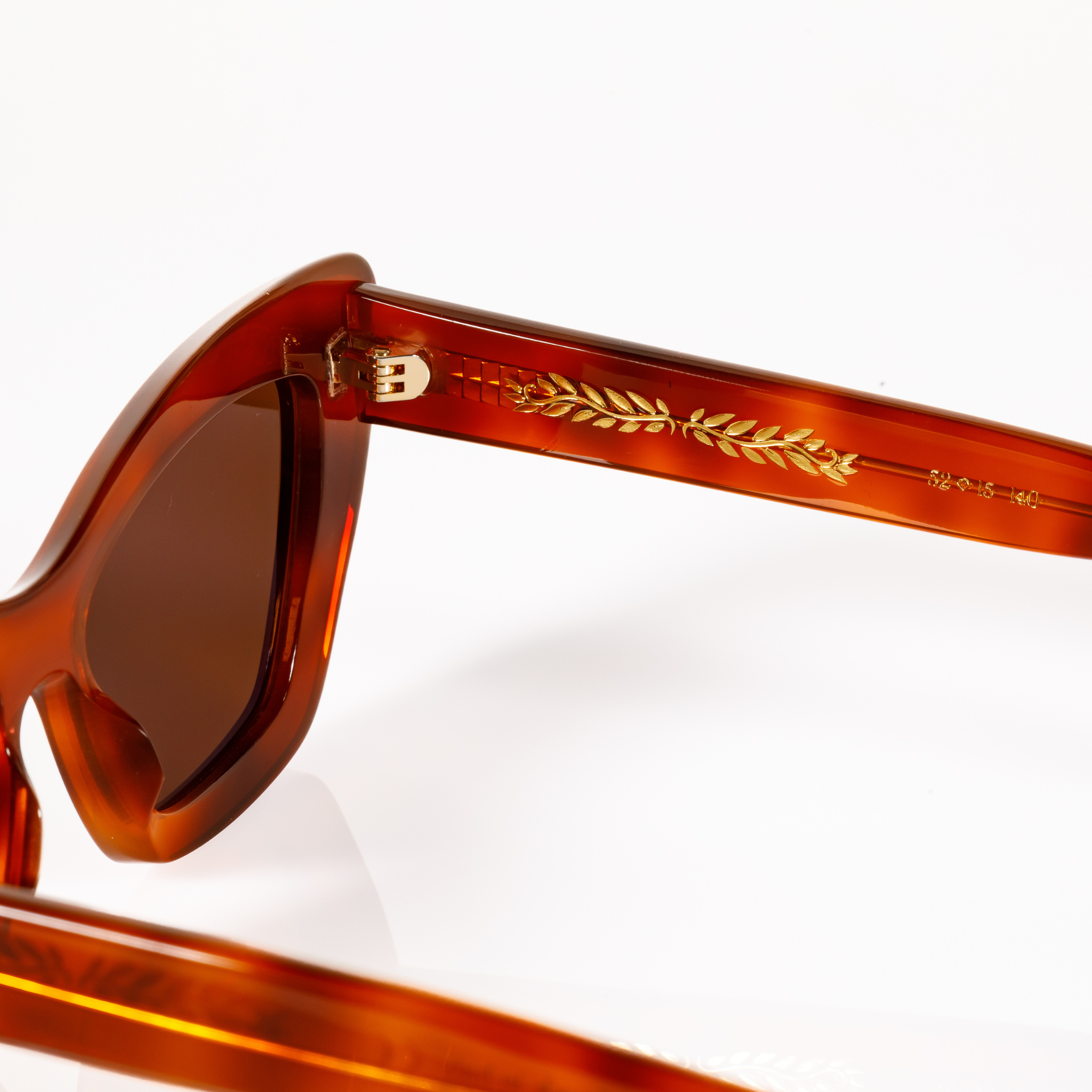 Small size cat eye sunglasses tortoise shell best sunglasses for petite faces and small faces internal hinge detail with gold accents