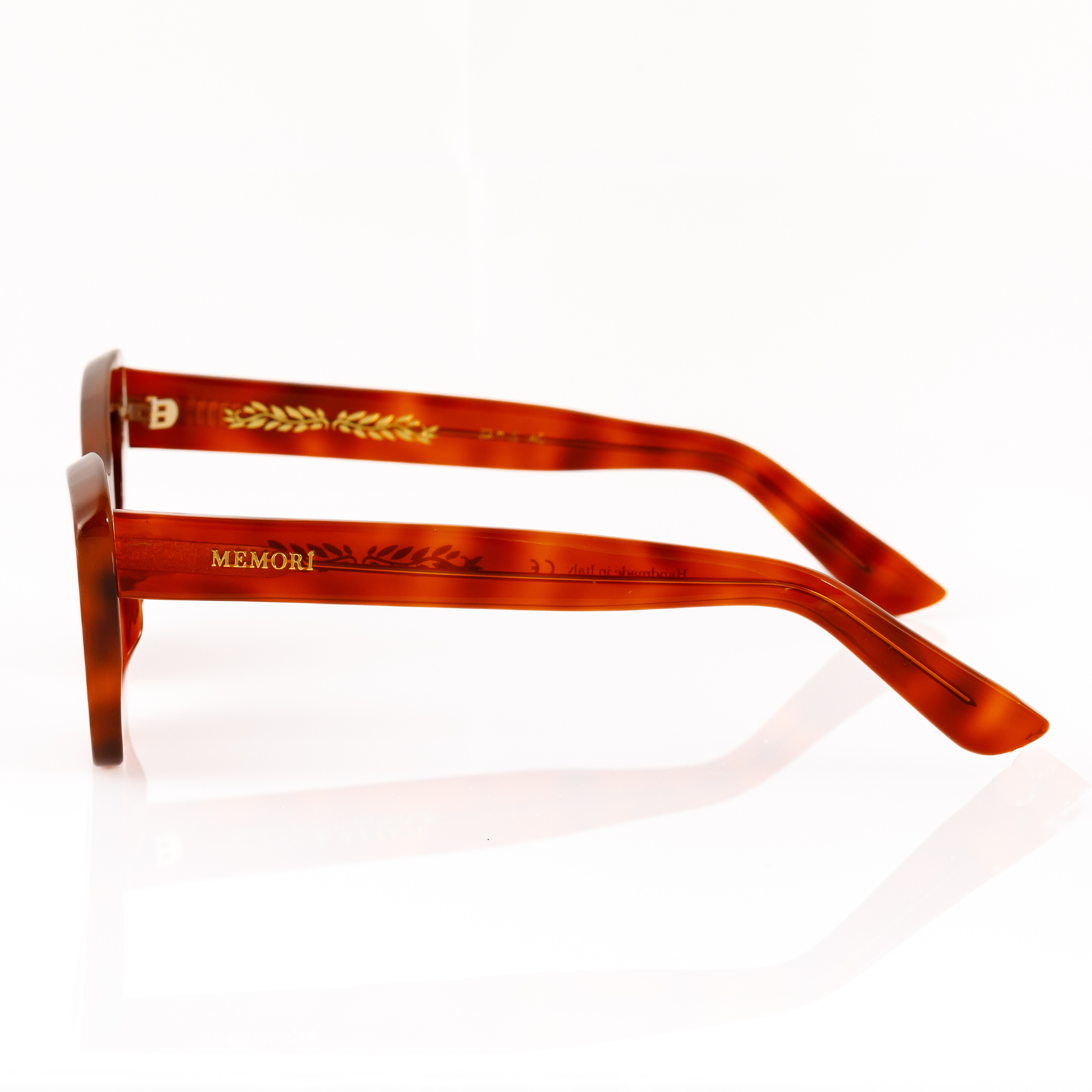 Small size cat eye sunglasses tortoise shell best sunglasses for petite faces and small faces profile view of temple arm and gold logo