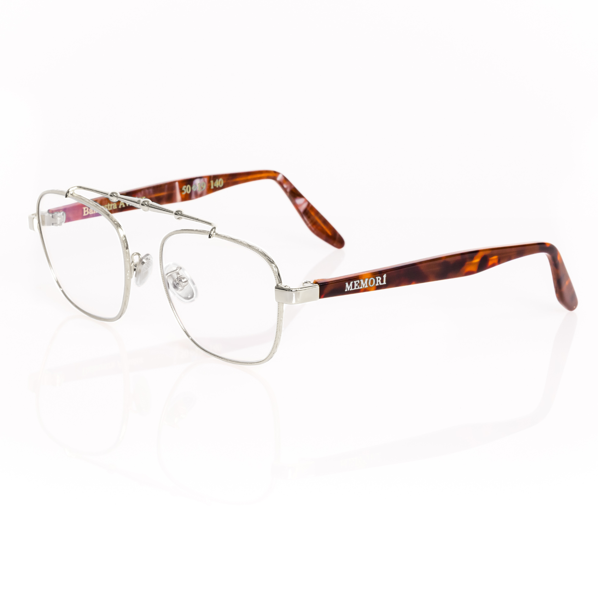 3/4 view of memori balaustra aviator optical frames in silver with transparent lenses, brown tortoise acetate temple arms, and a sculptural silver horizontal top bar on a white background. 