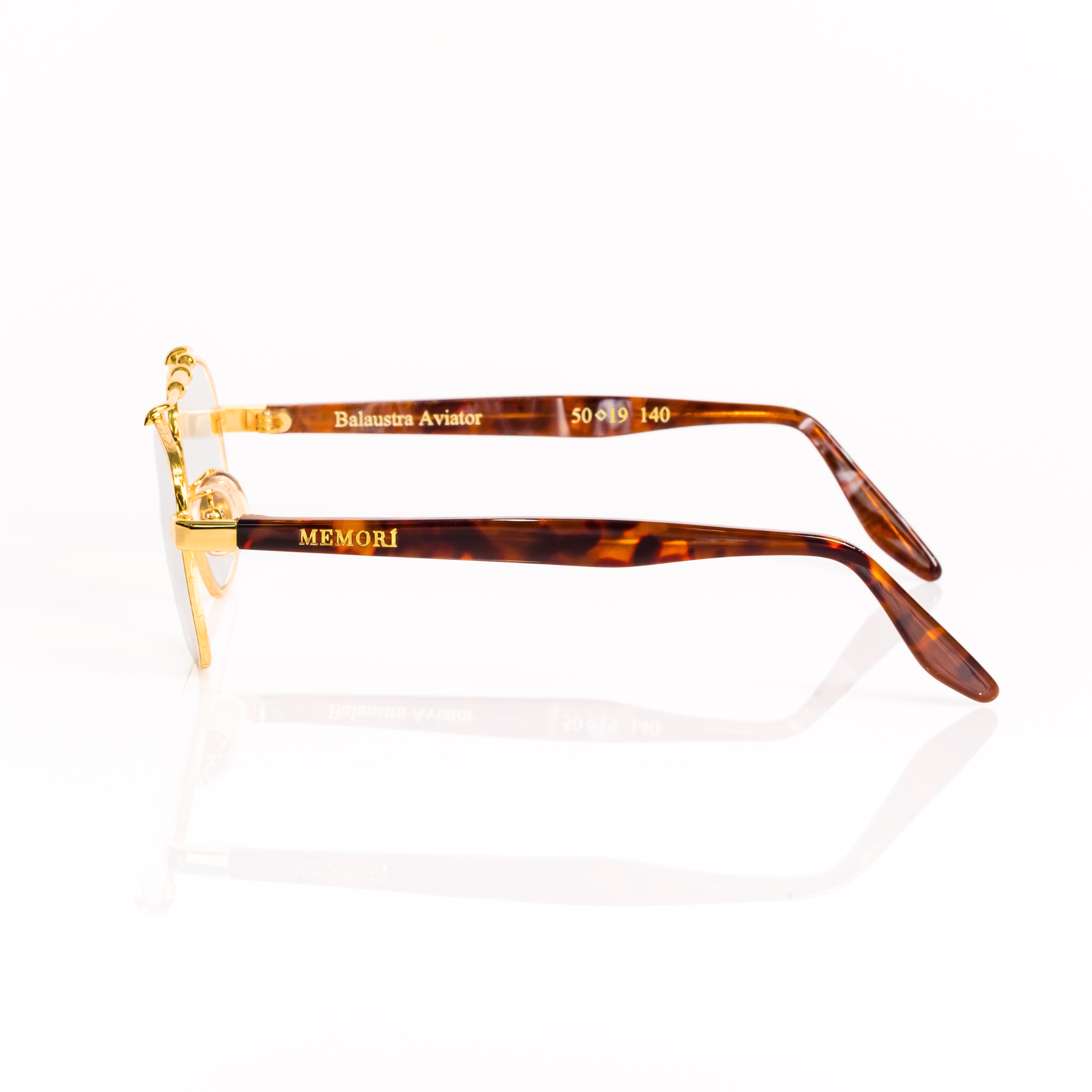 Side view of Balaustra Aviator glasses that show the sleek shape of the brown tortoise temple arm.