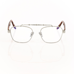 Front view of memori balaustra aviator optical frames in silver with transparent lenses, brown tortoise acetate temple arms, and a sculptural silver horizontal top bar on a white background. 