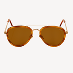 Forward view of aviator silhouette sunglasses on a white background. Lenses are a yellow/gold color, frame is gold, and there are acetate sheaths surrounding the lenses and at the temple tips in a brown color.