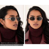 Side-By-Side photo of a woman with a small face shape wearing the Laurel Oval sunglasses in silver, size medium. The green lenses are dark and almost appear gray on the face. One view is facing forward, one view looking to the side, exposing the intricate metal leaf blinder details on the external rim of the glasses.