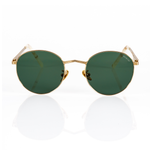 gold metal framed sunglasses with green lenses and a round lens shape on a white background. 