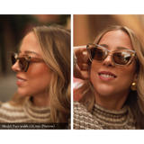 side-by-side image of a woman with a 126mm (narrow) face width wearing memori cat eye sungalsses in smoked crystal frame color with brown lenses. Left photo shows the side view, where the "Memorí" Logo is visible in gold on the external temple arm along with an intricate gold leaf design detail. Right image is a forward facing view which better shows the beveled side details and the transparency of the acetate frame material. 