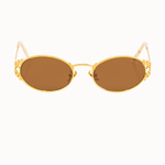 gold metal sungalsses with an oval shaped lens. lens color is brown. lenses are framed by an intricate gold leaf detail. white background. 