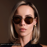 sunglasses designed for women with petite face, memori, round model being shown on model with very narrow face. 