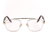 Silver framed blue light glasses with tortoise temple arms and a detailed metal upper brow bar on a white background. 