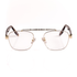 Silver framed blue light glasses with tortoise temple arms and a detailed metal upper brow bar on a white background. 
