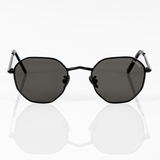 front view of memori black hexagon sunglasses with black polarized lens. 