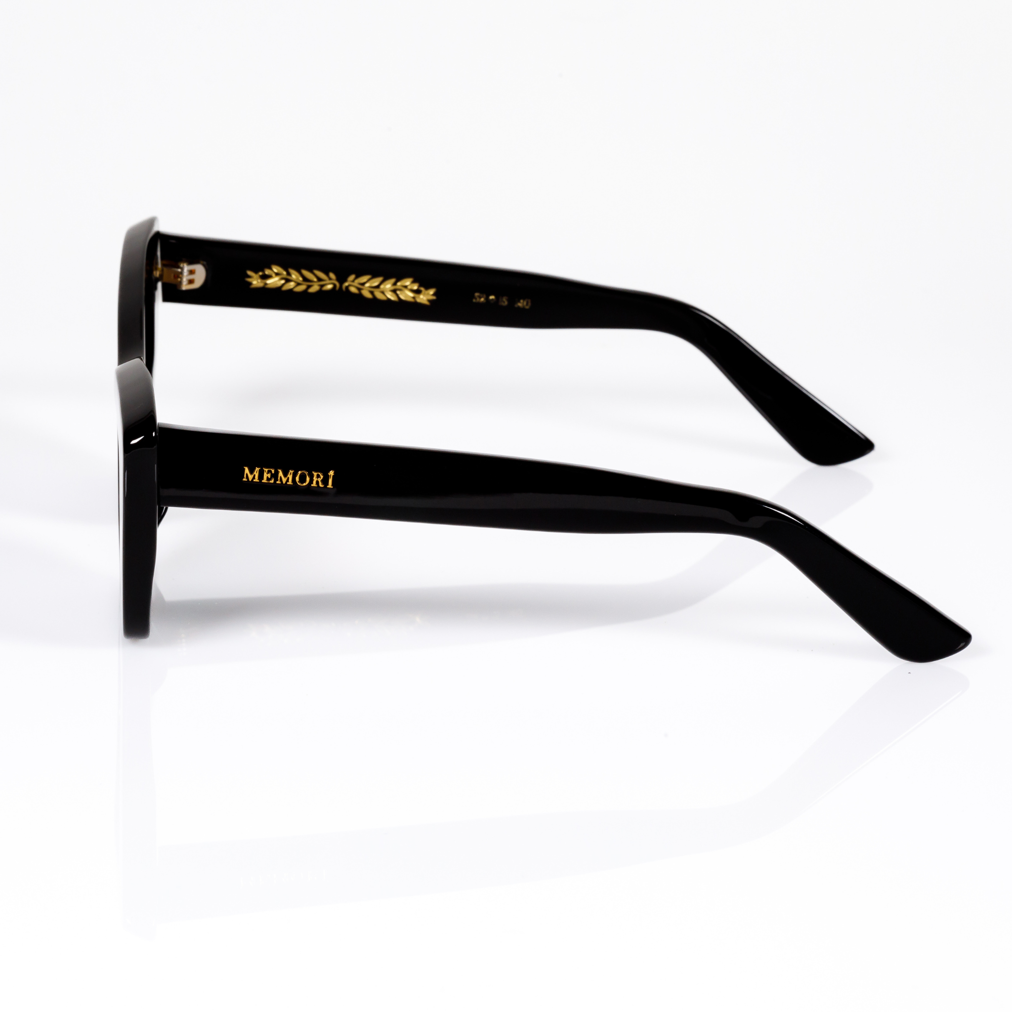 acetate cate eye sunglasses size small, profile view product image. features gold foil laurel leaf internal temple arm detail and external inlaid memorí logo