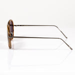 memori gunmetal aviator sunglasses. Photo shows profile view of temple arm and the fine metal details designed into the frame. Temple arm is stainless steel with no bulky temple tip. 