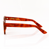 Small size cat eye sunglasses tortoise shell best sunglasses for petite faces and small faces profile view of temple arm and gold logo