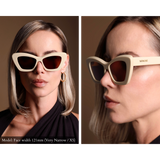 Memori ivory cat eye sunglasses as worn by a model with a very narrow, extra small face. Forward looking photo shows dramatic shape and dark brown lens, while side view photo shows the beautiful angled top of the frame